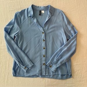 Blue cropped button down blouse